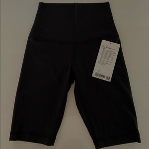 Brand new with tags, size 4 lulu 10’ align biker shorts